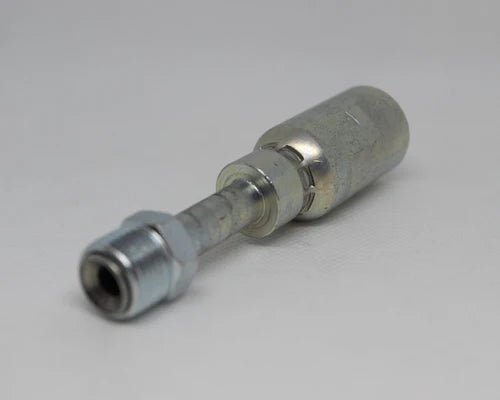 Close-up of a metallic CS18-6x5 Weatherhead fitting with a cylindrical connector and threaded attachment on a white surface. This 3/8 hose x 5/16 inverted male fitting boasts a shiny finish, perfectly matching 100R1 hoses for seamless integration.
