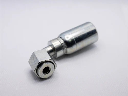 A Weatherhead 08UA68 metallic hydraulic fitting with a hexagonal nut and cylindrical body is placed on a light gray surface.