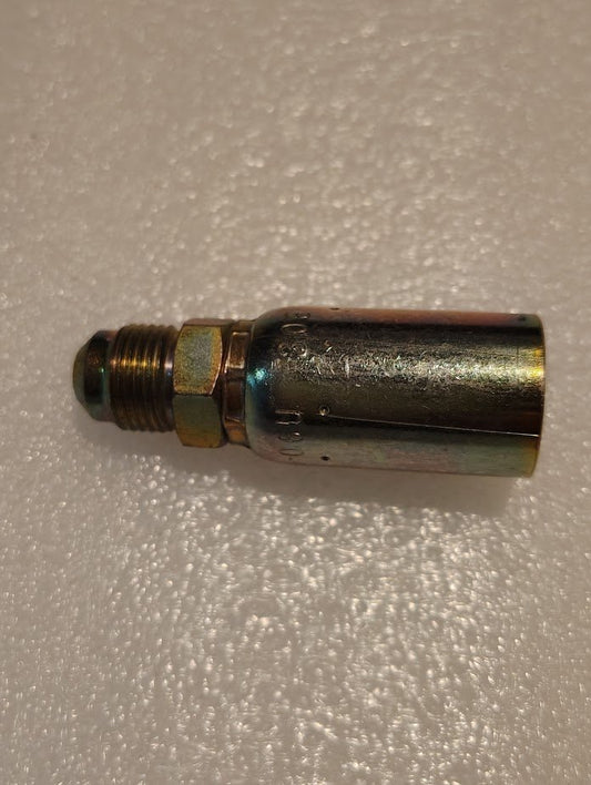 A close-up of the 06U-306 Weatherhead 3/8 Hose x 3/8 SAE Male Fitting (CS06-6X6), featuring a metallic body with hex nut, is displayed on a textured white surface for secure hydraulic connections.