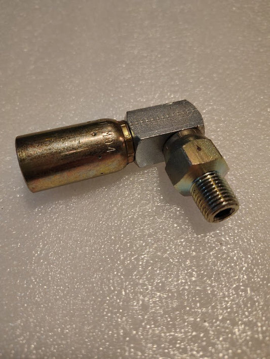 A close-up of the Weatherhead 06U-M04 3/8 Hose x 1/4 NPTF Male Fitting (CS14-4X6) with angled joint, textured nut, and threaded end, highlighting its quality on a white textured surface.