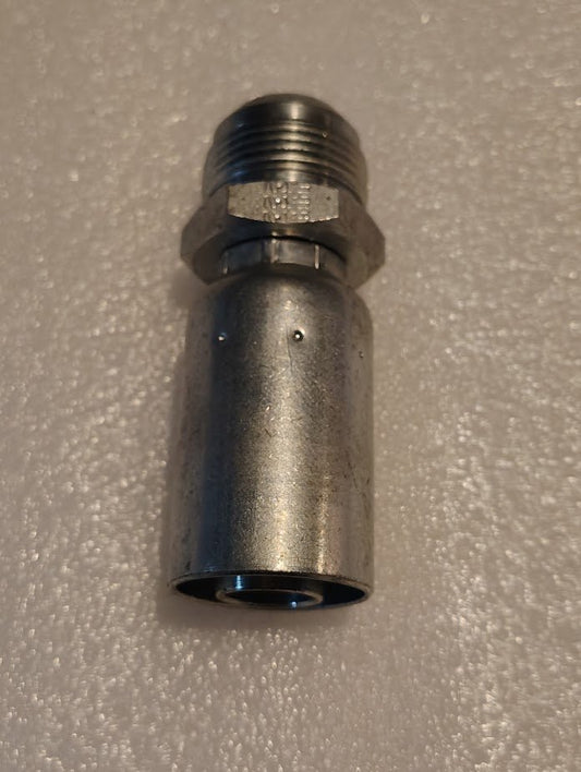 A close-up photo of the Weatherhead 12U-516 3/4 Hose x 1 SAE Male Fitting (CS08-12X16), a metal hydraulic fitting compatible with 100R1 hoses, featuring a threaded end and shown on a textured white surface.