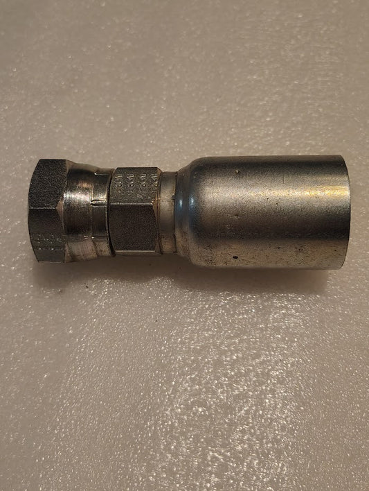 A Weatherhead 16U-366 (CS10-16X16) 1 Hose x 1 BSPP Female metal hydraulic fitting with a hex nut end, designed for 100R1 hoses, is shown close-up on a textured light surface.