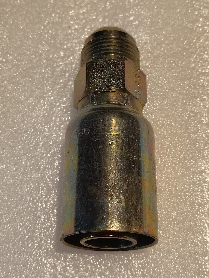 A close-up of the 16U-514 | Weatherhead 1 Hose x 7/8 SAE Male Fitting (CS08-16X14) with a threaded end and hexagonal nut, shown on a textured, light-colored surface.