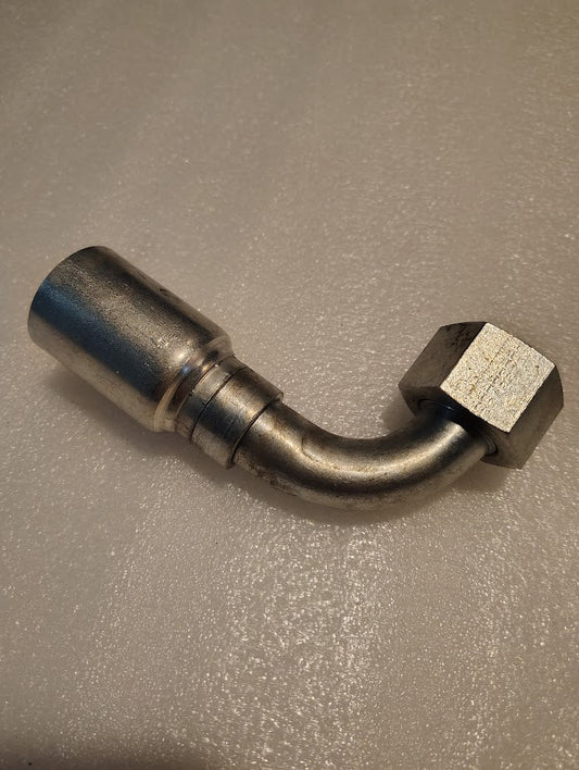 The 16U-A36 Weatherhead 1 Hose x 1 ORF Female Fitting (CS32-16X16) is a metal hydraulic fitting with a 90-degree bend, cylindrical end, and hex nut—compatible with 100R1 hoses and Weatherhead fittings.