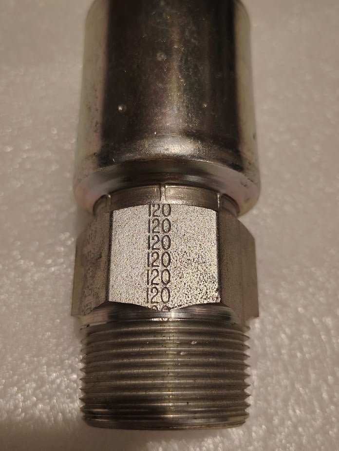 A close-up of the Weatherhead 20U-120, a 1 1/4 hose x 1 1/4 NPTF male fitting (CS01-20X20), with engraved 1200 on its hexagonal section. Compatible with hydraulic hoses, shown against a textured light surface.