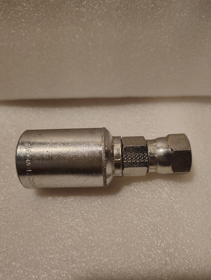 A Weatherhead 43008U-608 GW09-8x8 1/2 hose x 1/2 JIC female fitting with a cylindrical body and hexagonal nut is shown from the side, resting on a textured white foam surface.