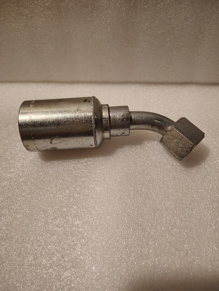A close-up of a Weatherhead 43008U-688 fitting (1/2 hose x 1/2 JIC female, GW25-8x8) with a 90-degree bend, textured finish, and threaded hex nut, shown resting on a white textured background.