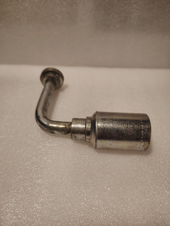 A 43008U-G71L32 1/2 Hose x 1/2 Code 61 Flange Fitting (GW54-8x8), a metal L-shaped hydraulic pipe with a cylindrical and flanged end, is shown on a white textured surface.