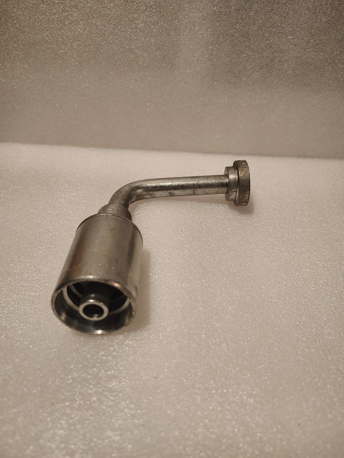 The 43008U-G71L32 | 1/2 Hose x 1/2 Code 61 Flange Fitting - 90 Long bend (GW54-8x8) is a small, metallic, L-shaped hydraulic hose fitting with a cylindrical end and flat, round flange on a white, textured surface.