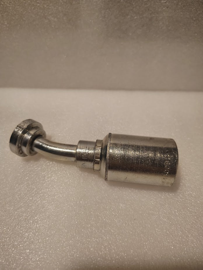 A 43008U-H01 | 1/2 Hose x 1/2 Code 61 Flange Fitting with a 22.5° bend (GW48-8x8) made of metal and featuring threaded ends rests on a white textured surface, resembling hydraulic hose fittings.