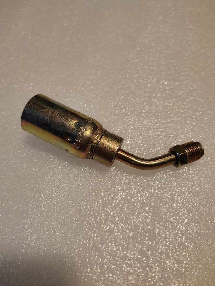 A copper-colored metal part with a cylindrical body, bent end, and threaded fitting resembles the 06U-B44 Weatherhead 3/8 Hose x 1/4 Inverted Male Fitting - 45 Swivel, resting on a textured white surface.