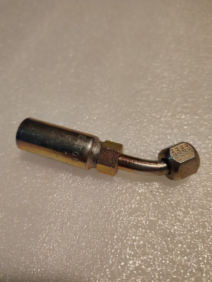 The Weatherhead 04U-685, a 1/4 hose fitting with a 5/16 JIC/SAE female connection, features a 45-degree swivel and threaded ends. It has a cylindrical body with a central hexagonal nut, making it ideal for hydraulic systems compatible with 100R1 hoses.