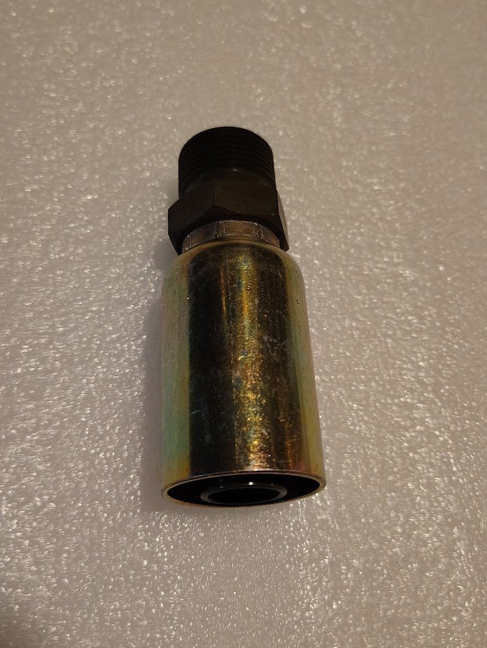 A Weatherhead 12U-P62 hydraulic hose fitting, 3/4 Hose x 3/4 BSPT Male, features a threaded black end and shiny cylindrical body on a textured white surface with its threaded end at the top.