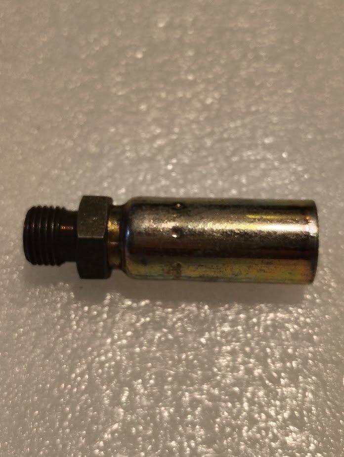 A 04U-P54 Weatherhead fitting, with a threaded black tip and cylindrical silver body, reminiscent of hydraulic hose fittings, sits on a textured light surface. It serves as a connector or adapter compatible with the Weatherhead system.