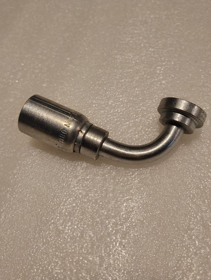 The 08U-G71 Weatherhead fitting, a 1/2 hose x 1/2 Code 61 flange with a smooth, shiny finish and elbow design, is displayed on a textured white surface.