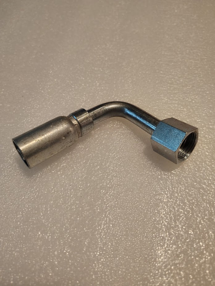 The 06U-A68 Weatherhead 3/8 Hose x 1/2 ORF Female Fitting (CS33-6X8) has a 90-degree bend, hexagonal nut, and cylindrical connector, shown on a textured light surface, for use with compatible hoses and Weatherhead fittings.