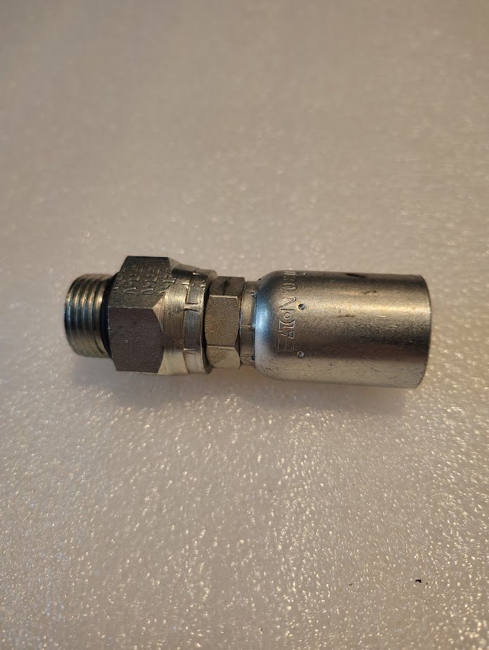 The Weatherhead 08U-R10 CS12-8X10 fitting, sized 1/2 hose x 5/8 ORB male, with a crimped collar, is compatible with 100R1 hoses and rests on a textured white surface.