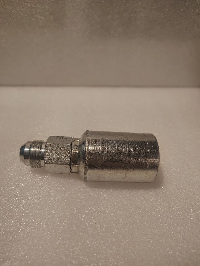 A 43008U-508 | 1/2 Hose x 1/2 JIC Solid Fitting - Straight (GW08-8x8) rests on a white textured surface, featuring a cylindrical end and a hexagonal nut with a threaded tip.