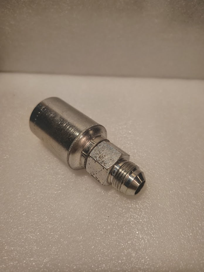 A 43008U-508 | 1/2 Hose x 1/2 JIC Solid Fitting - Straight (GW08-8x8) with hexagonal nut and threaded end rests on a reflective white foam surface.