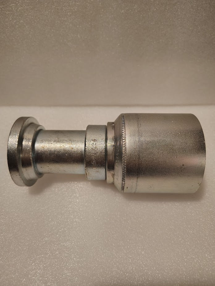 A 43024U-G24 | 1 1/2 Hose x 1 1/2 Code 61 Flange Fitting - Straight (GW47-24x24), with a wide cylindrical end and grooved side, is shown on a textured white surface.