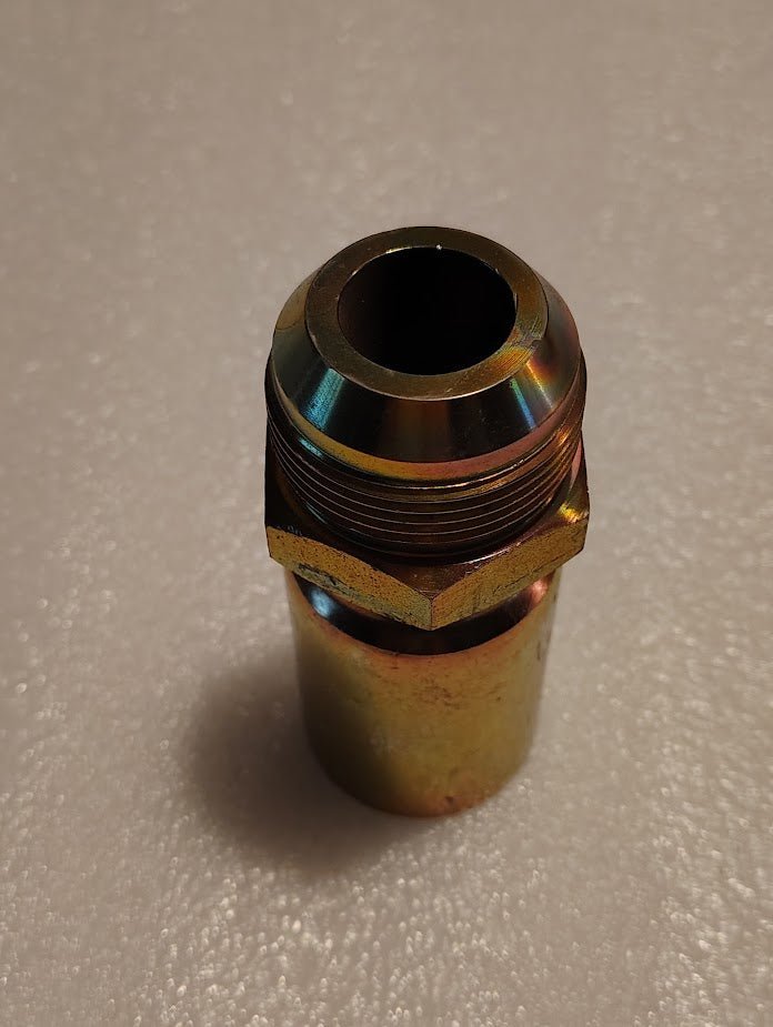 The 16U-520 Weatherhead fitting features a metallic cylindrical body with a hexagonal nut. It has threaded grooves and is compatible with 100R1, showcasing an industrial appearance on a textured surface.