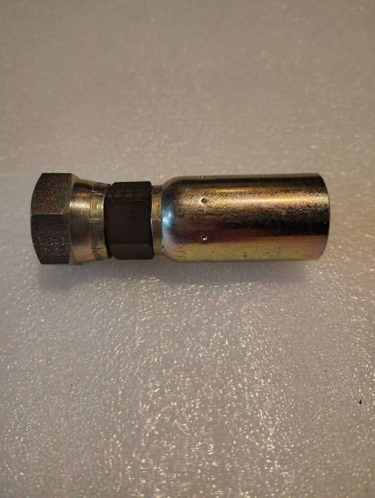 The 10U-360 Weatherhead fitting, compatible with 100R1 and featuring a hexagonal end and cylindrical connector, rests on a textured light gray surface. Its shiny silver finish gives it a slightly reflective sheen.