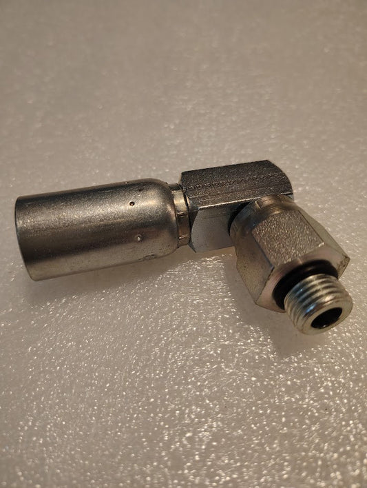 A Weatherhead 06U-R66 fitting, designed for 3/8 hose and ORB male connections with a 90-degree swivel elbow, is placed on a textured white surface. It features a cylindrical and hexagonal section with a threaded end, has a metallic finish, and is ideal for 100R1 hoses.