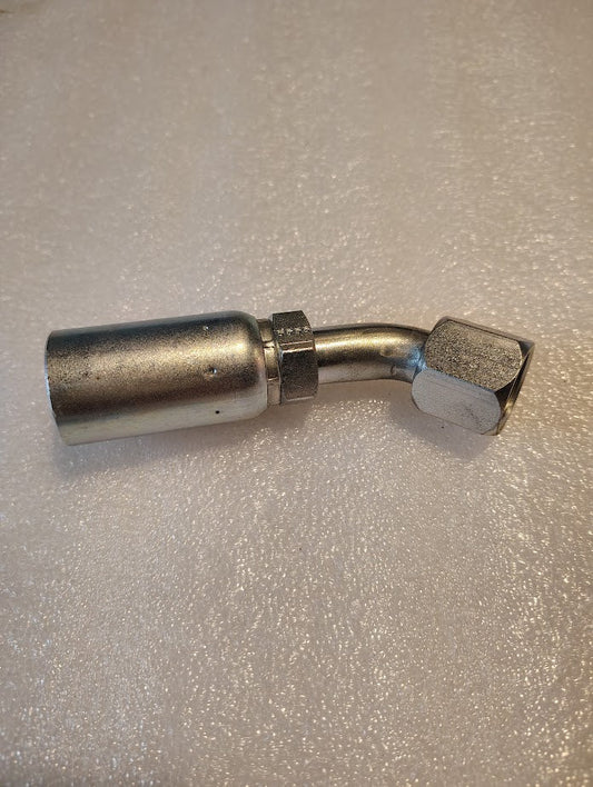 The 10U-690 Weatherhead 5/8 hose x 5/8 JIC/SAE female fitting features a bent shape compatible with Parker and Weatherhead. It includes a hexagonal nut at one end and a cylindrical section at the other, displayed on a textured white surface.