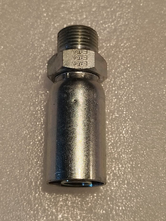 A Weatherhead 5/8 Hose x 5/8 BSPT Male Fitting features a cylindrical bottom, threaded top, and hexagonal nut with engraved specs, resting on a textured white surface. It offers precise compatibility with hydraulic hoses.